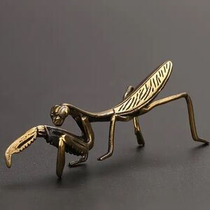 Brass praying mantis